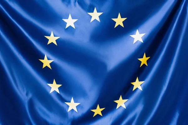 Close up de bandeira da união europeia azul com estrelas amarelas — Fotografia de Stock