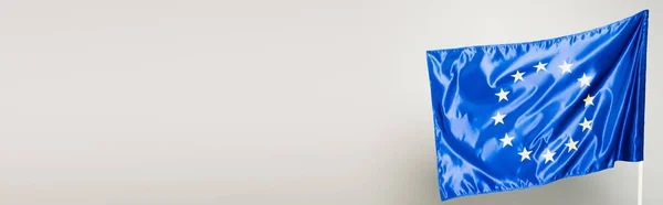 Blaue europäische Gewerkschaftsfahne isoliert auf grau, Banner — Stockfoto