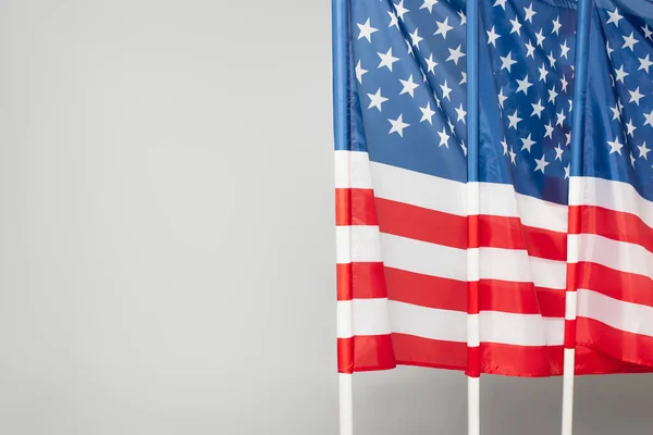 Red and blue flags of america with stars and stripes isolated on grey — Stock Photo