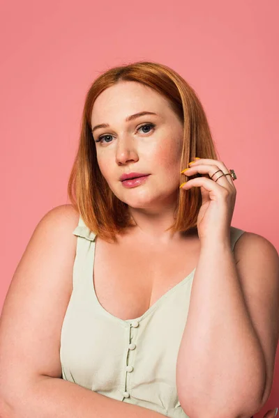 Pretty plus size woman posing isolated on pink — Stock Photo