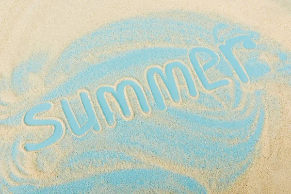 Top view of summer lettering on sand and blue surface — Stock Photo