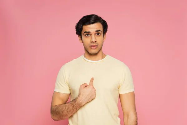 Young man pointing with finger at himself isolated on pink — Stock Photo