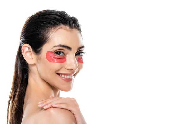 Joyful young woman with eye patches isolated on white — Stock Photo