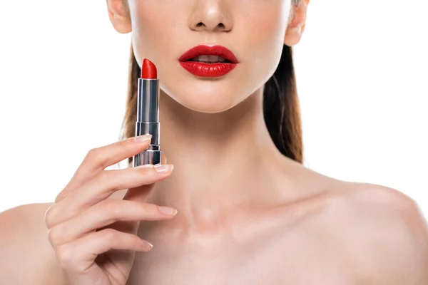 Cropped view of young woman with red lips and bare shoulders holding lipstick isolated on white — Stock Photo