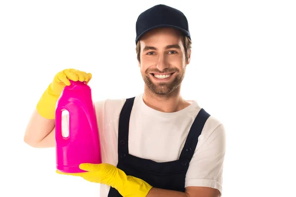 Limpiador joven en guantes de goma y botella uniforme de detergente aislado en blanco - foto de stock