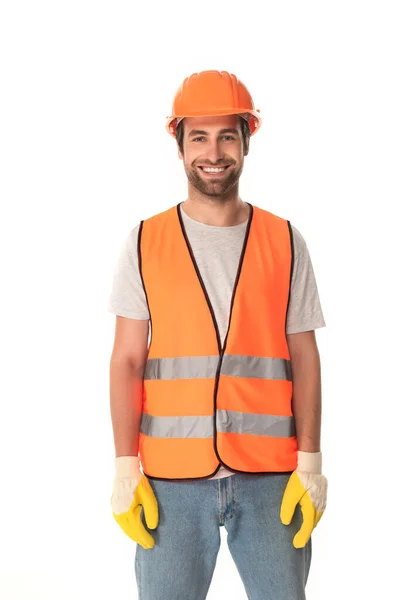 Alegre constructor en casco mirando a la cámara aislada en blanco — Stock Photo