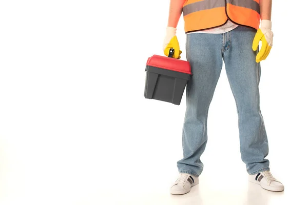 Cropped view of serviceman holding toolbox on white background — Stock Photo