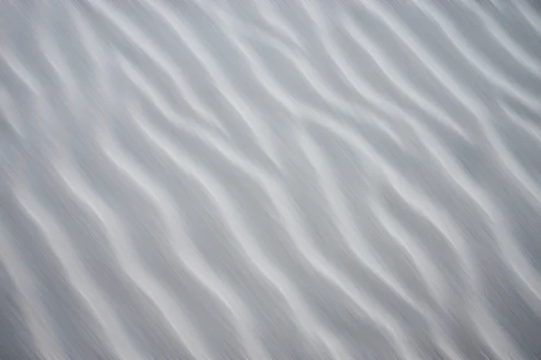 Ruchu linii piasku na plaży. Z ostrości obrazu. — Zdjęcie stockowe