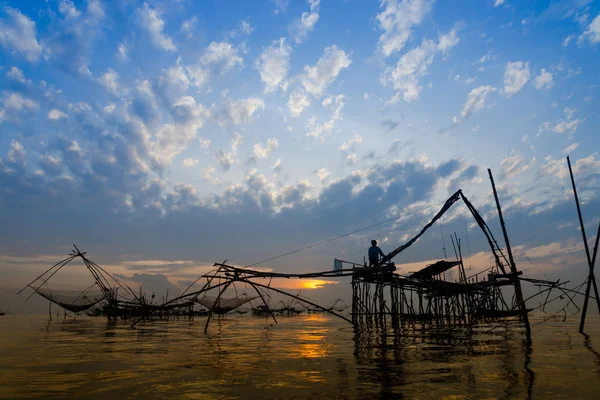 Fishing gear with sunrise at Pakpra ,Phatthalung,Thailand — Stock Photo, Image