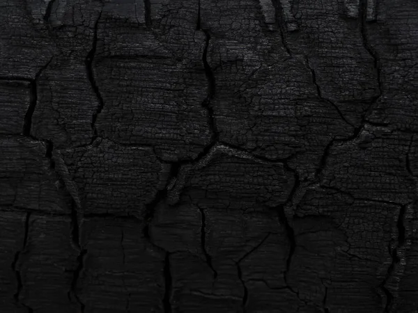 Kömürün yüzeyindeki detaylar. Düşük tuşlu resim.