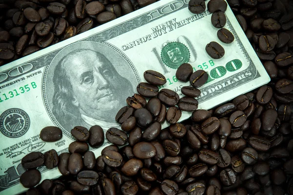 Roasted coffee beans and Money — Stock Photo, Image