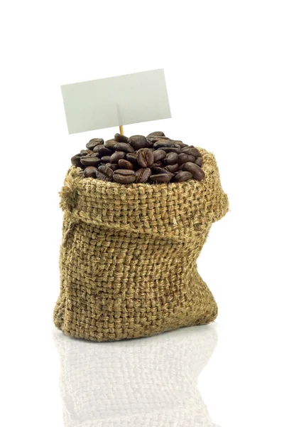 Grains de café dans un sac — Photo