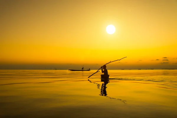 Silhouette of fishermen — Stock Photo, Image