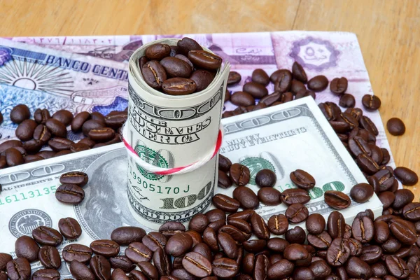 Money and roast coffee bean. — Stock Photo, Image