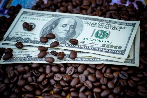 Money and roast coffee bean. — Stock Photo, Image