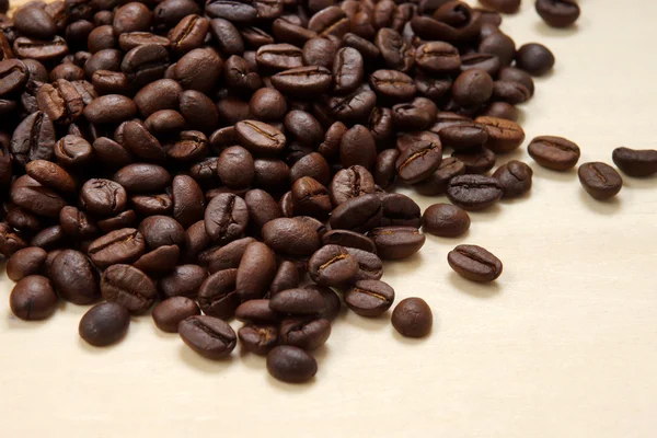 Coffee beans on the wood background. — Stock Photo, Image