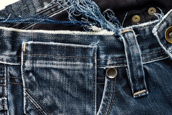 Close-up van oude jeans. — Stockfoto