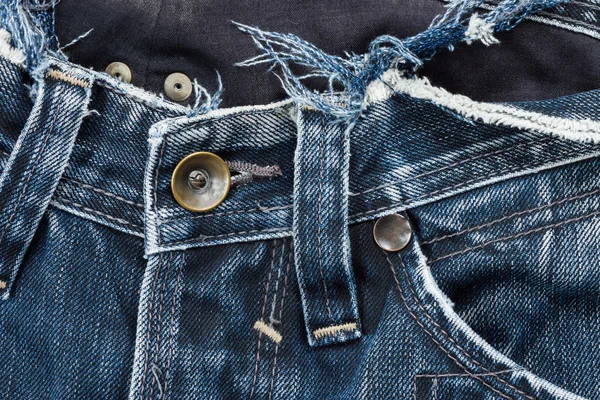 Close-up van oude jeans. — Stockfoto