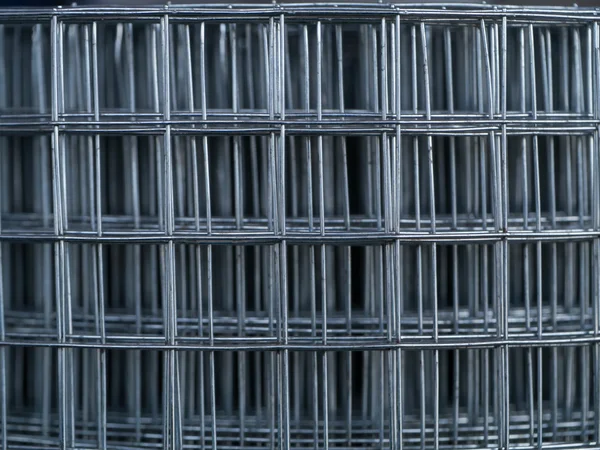 Roll of a metal grid close up. — Stock Photo, Image