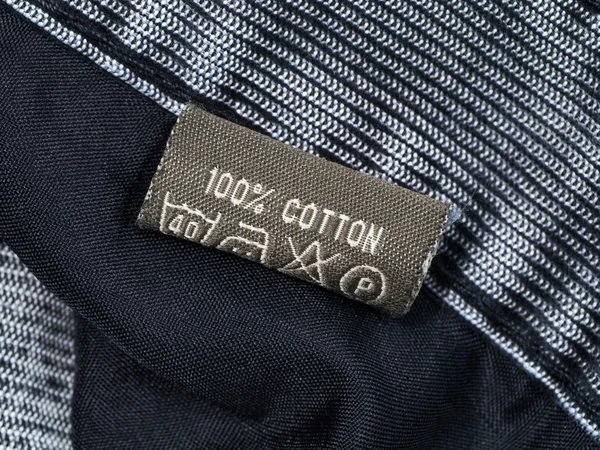 Old cotton tag of jeans. — Stock Photo, Image
