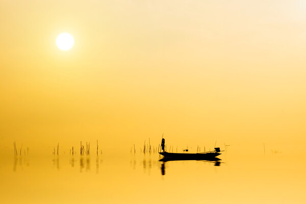 Beautiful sky and Silhouettes of Minimal fisherman at the lake, 