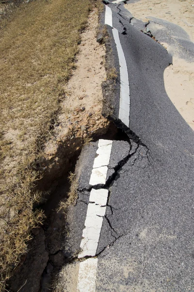 Road erosion caused by waves and severe storms. — Stock Photo, Image