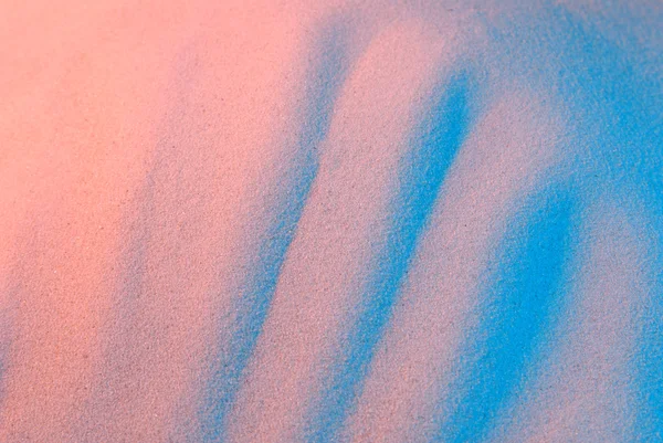 Tło z kolorowo oświetlone piasku — Zdjęcie stockowe
