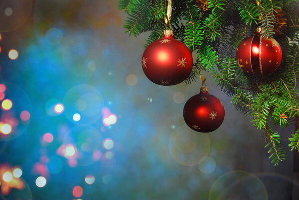 Christmas balls and light on a dark background