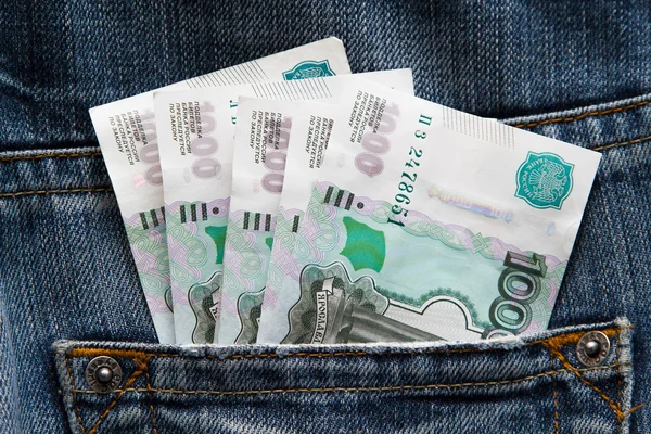 Banknotes are in the pocket of jeans Royalty Free Stock Images