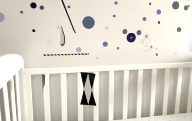 Montessori Munari Mobil Atlıkarınca bebek yatağının üzerinde asılı ve dönüyor. Siyah ve beyaz geometrik şekiller bebeklerin görme ve gelişmesini sağlar.