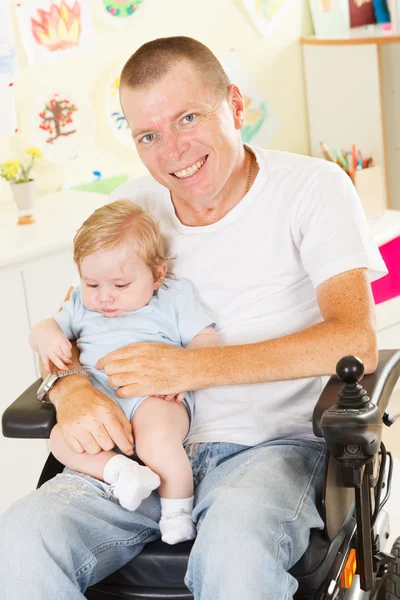 Disabled man with his son — Stock Photo, Image