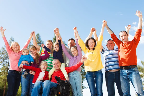 Gehandicapte Man met groep mensen Stockafbeelding