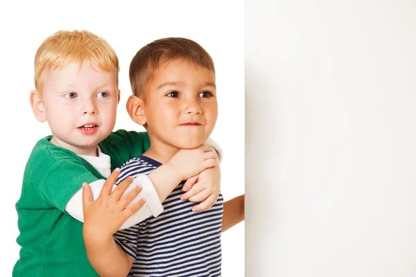 Little boys with blank placard — Φωτογραφία Αρχείου