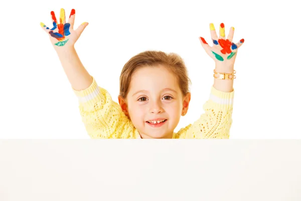 Preschooler girl with painted hands ロイヤリティフリーのストック画像