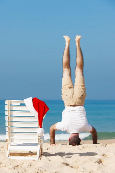 Santa at the beach — Stock Photo, Image