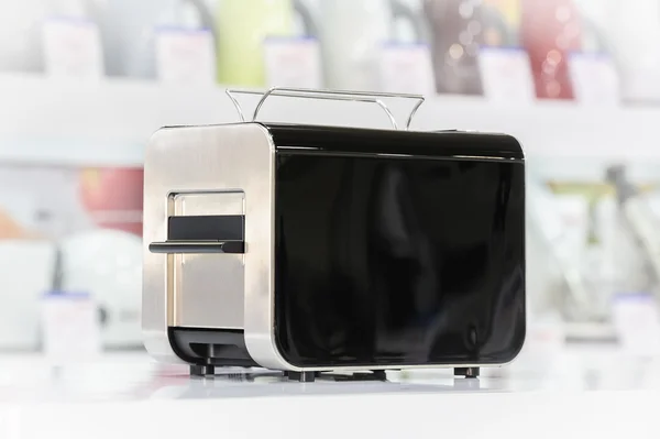 Shiny black toaster — Stock Photo, Image