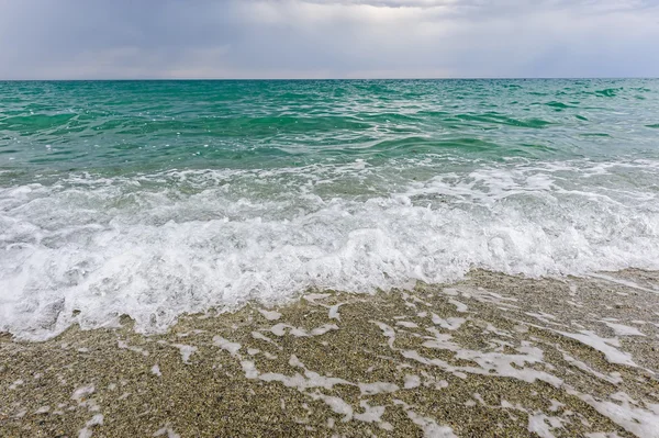 Arena y fondo de olas —  Fotos de Stock