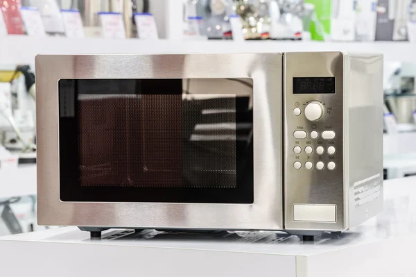 Microwave oven in retail store — Stock Photo, Image