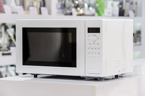 Microwave oven in retail store — Stock Photo, Image