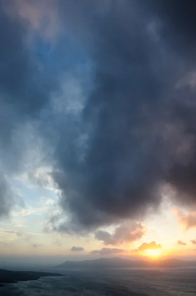 Dramatic sunset over Santorini caldera sea — Stock Photo, Image