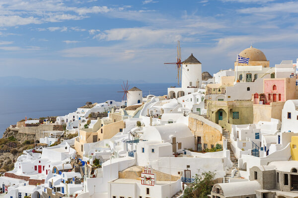 Oia in sunset rays at Santorini, Greece