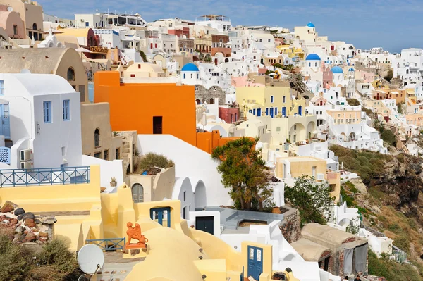 Oia in zonsondergang stralen op Santorini, Griekenland Stockfoto