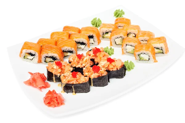 Conjunto de rollos de sushi Maki y uramaki aislados en blanco — Foto de Stock