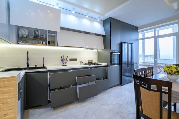 Luxury white and dark grey modern kitchen interior