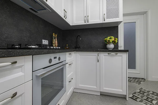 Luxury well designed modern black and white kitchen