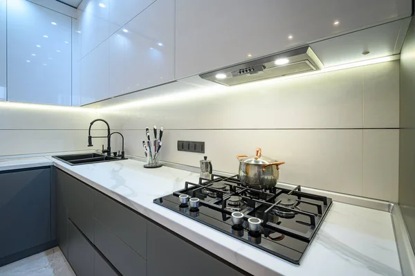 Close up to luxury gray modern kitchen interior — стоковое фото