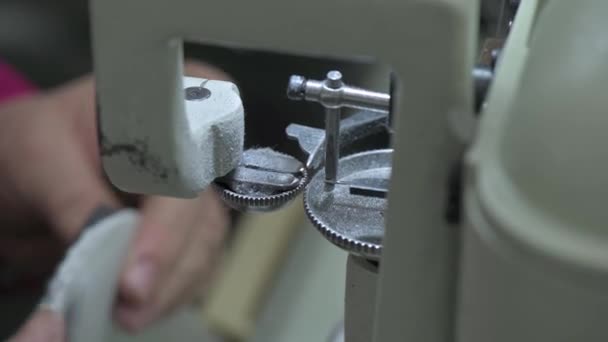Sewing inner part of sole to soft fabric shoe — Stock Video