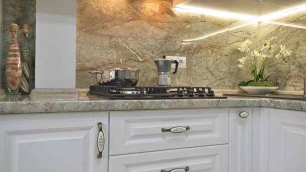 Closeup panning of modern classic white kitchen interior — Stock Video
