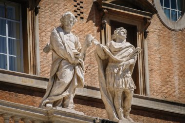 Statues on the roof of St. Peter Cathedral in Vatican clipart