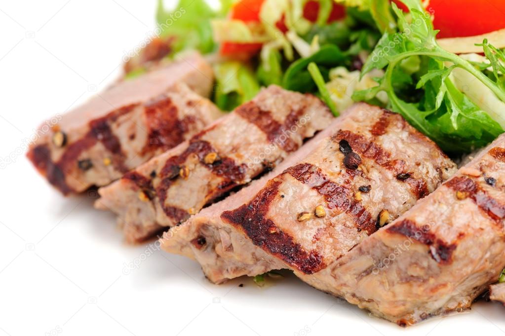 Veal meat with fresh vegetable salad